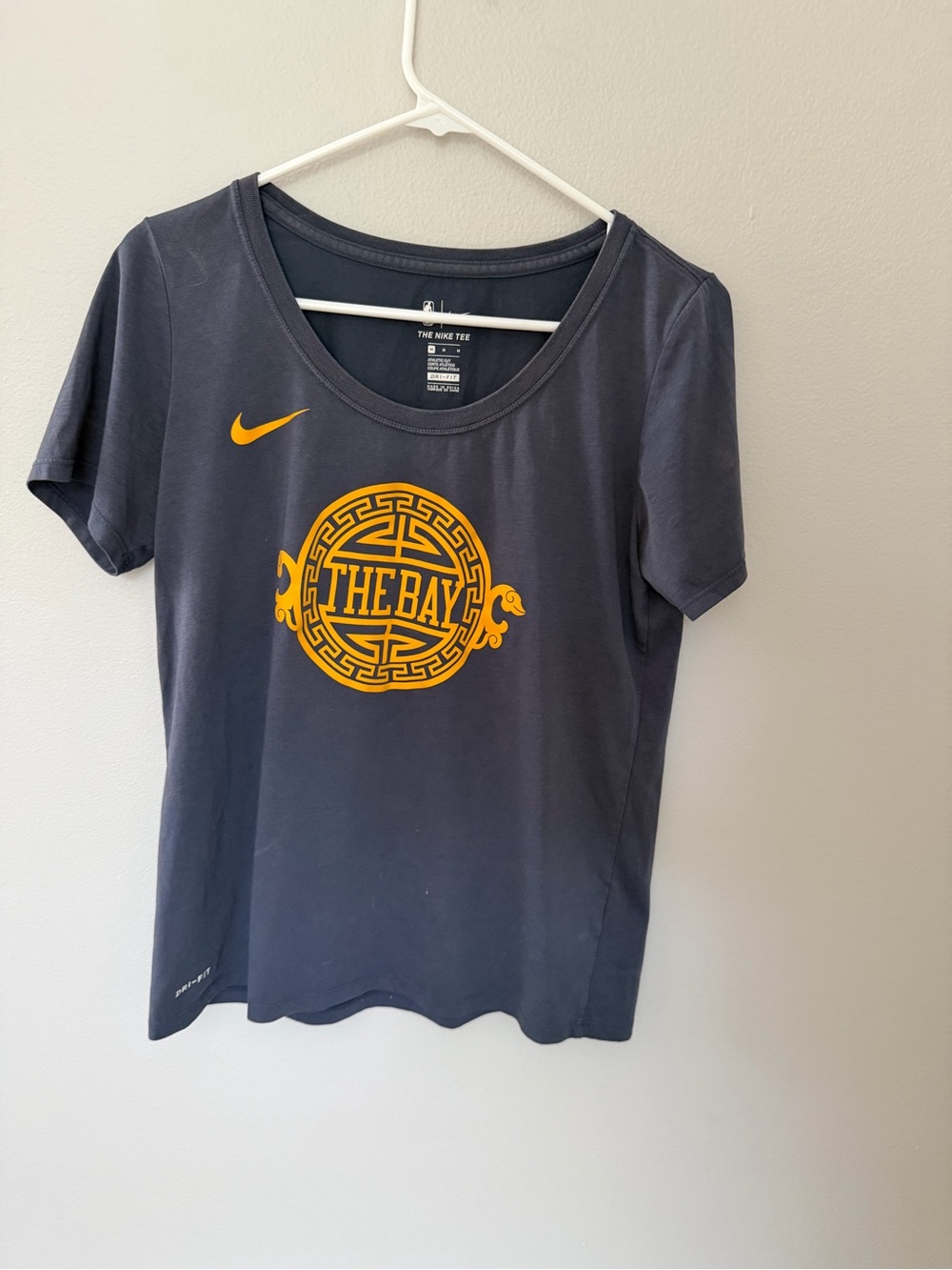 Nike Women’s Navy Short-Sleeve Golden Warriors City Edition.